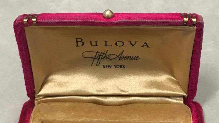 Bulova Fifth Avenue, New York — crimson velvet presentation box interior