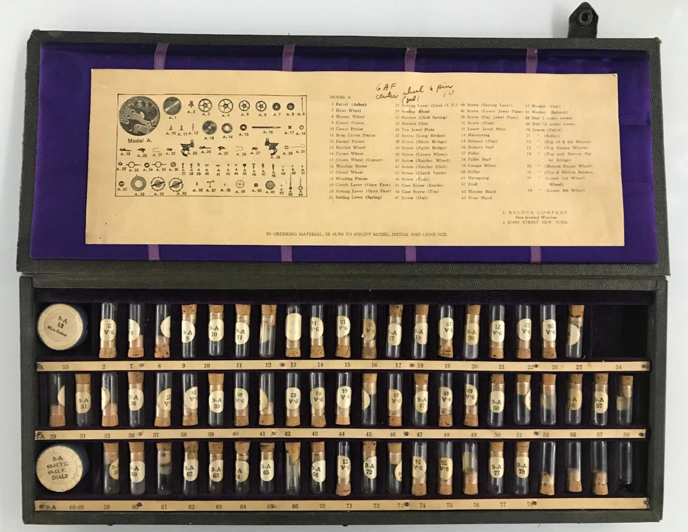 Bulova standardized watchmaker's parts kit — interchangeable components in corked glass tubes
